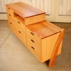 wood cabinet with drawers and slanted leg