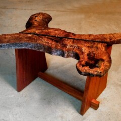 small wood bench made from wood burl