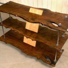 dark wood shelves with light wood connecting piece