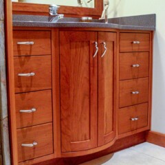 wood vanity with stone counter