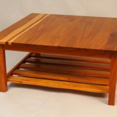 coffee table with wavy stripe of light wood