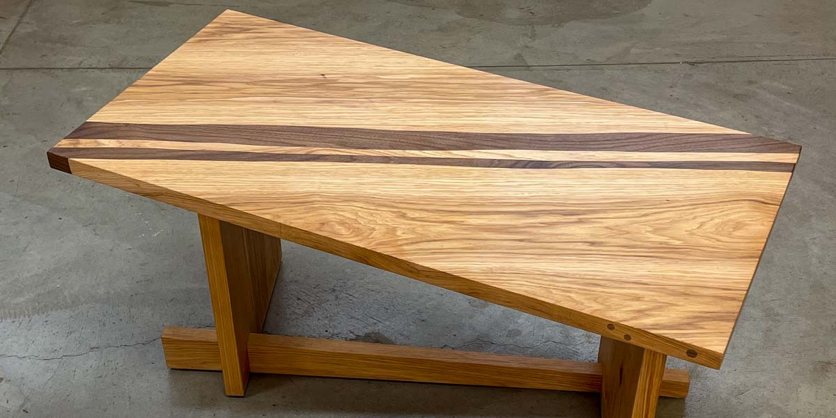 zigzag feature wood table with inlaid diagonal stripes